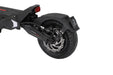 Close-up of a black electric scooter wheel on a white background